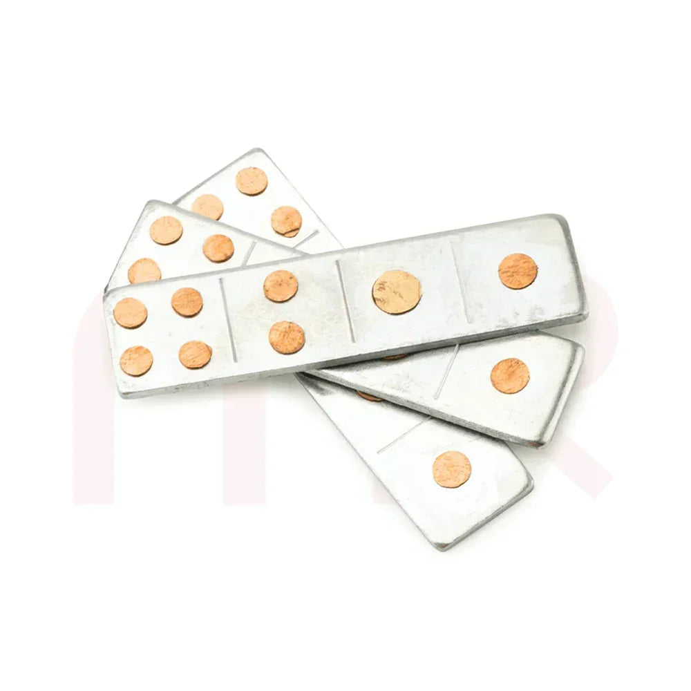 Rectangular metal strips with copper spots for Vastu remedies on white background
