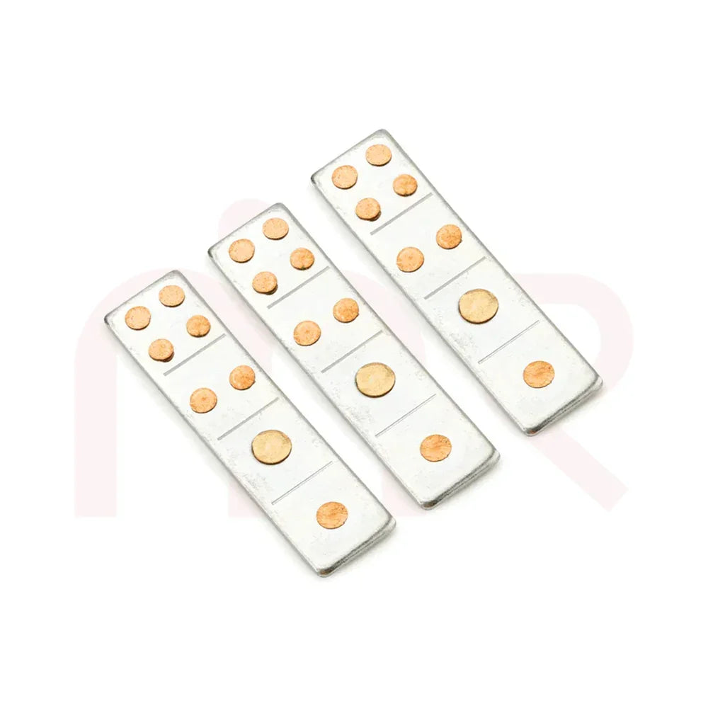 Three MahaVastu metal strips with copper dots for Vastu remedy on white background