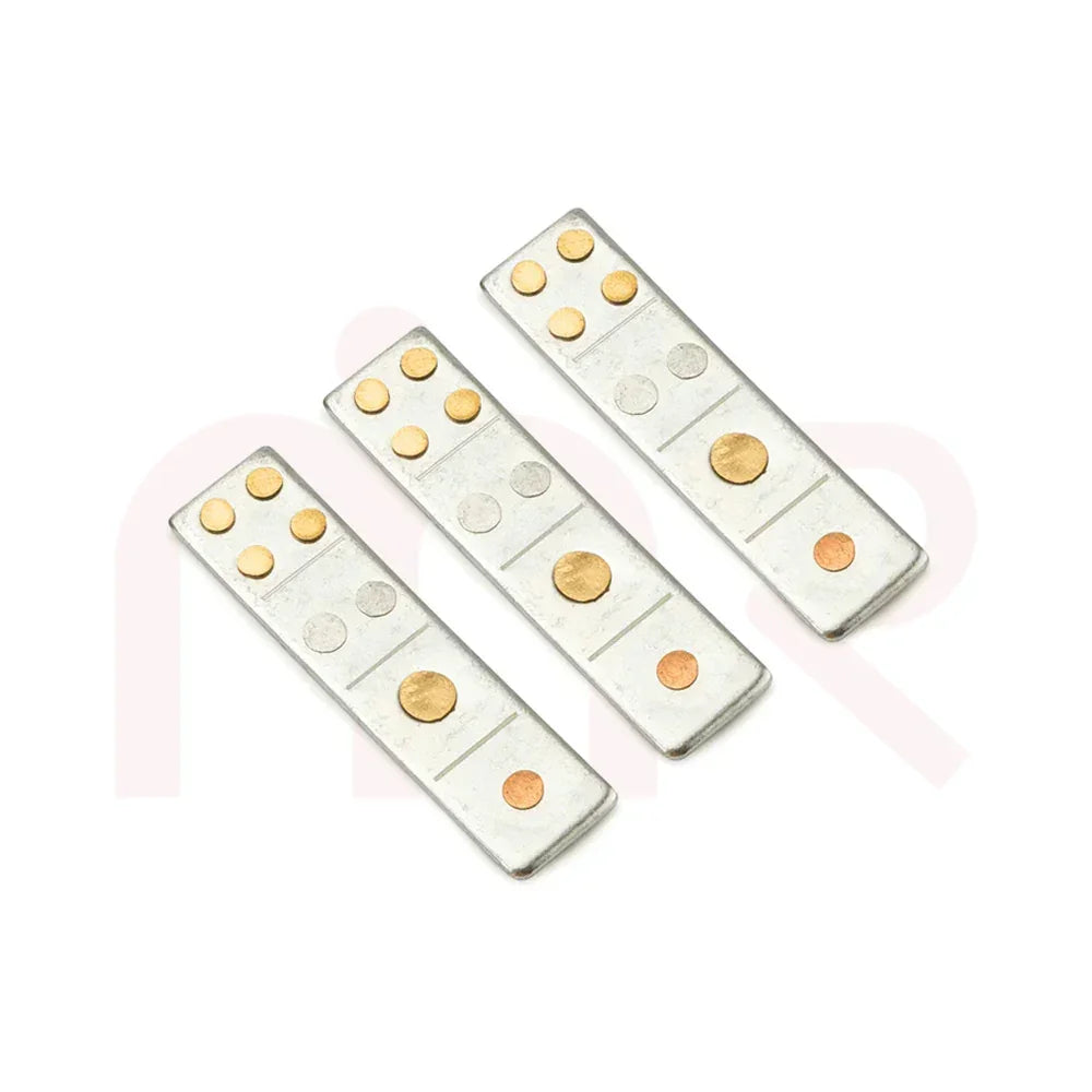 Set of three Vastu metal strips for home remedy, featuring silver, gold, and copper dots.