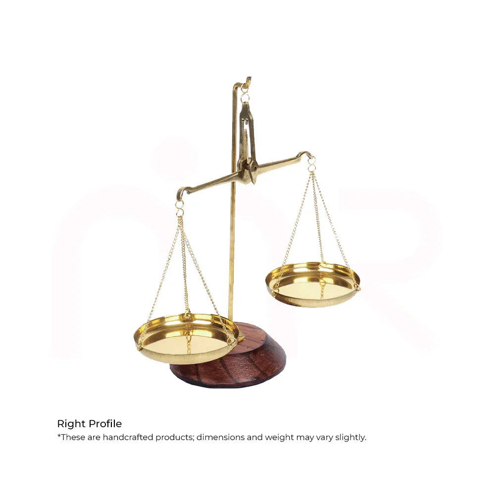 Handcrafted brass balance scale with wooden base for MahaVastu remedies, right profile view