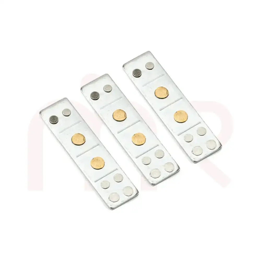 Three silver metal strips for Vastu Shastra remedies and space balancing.