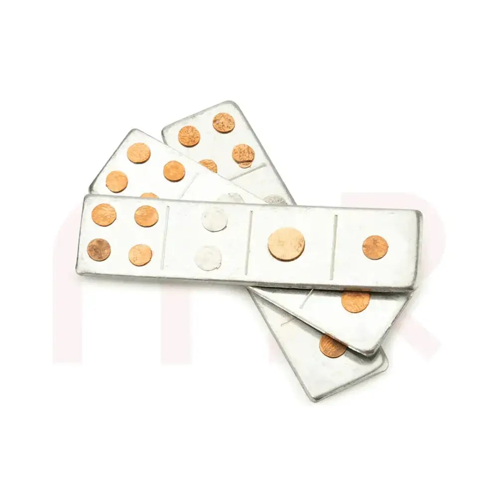 Silver metal strips with copper studs for Vastu Shastra remedies.