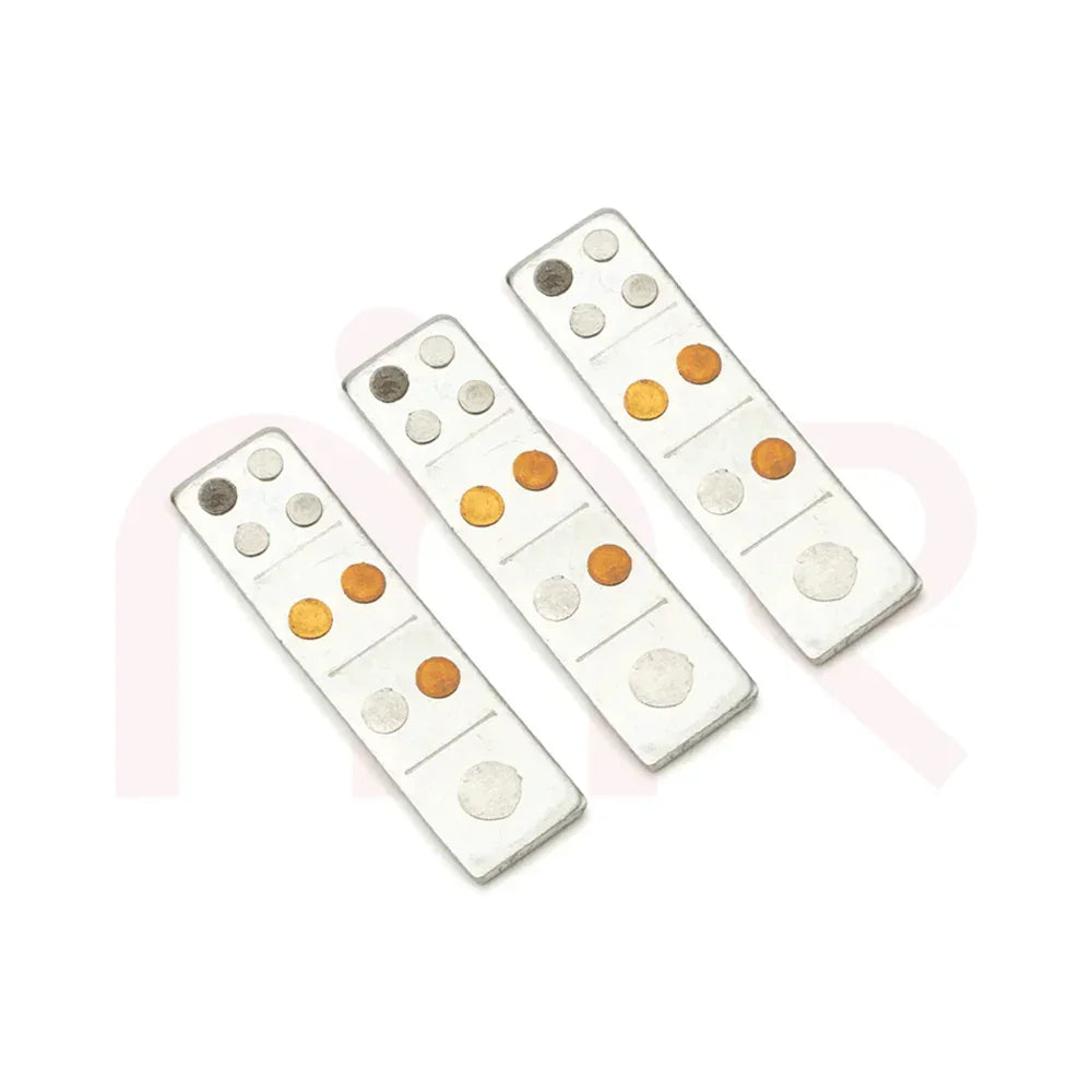 Three rectangular Vastu metal strips with gold and silver dots on a white background