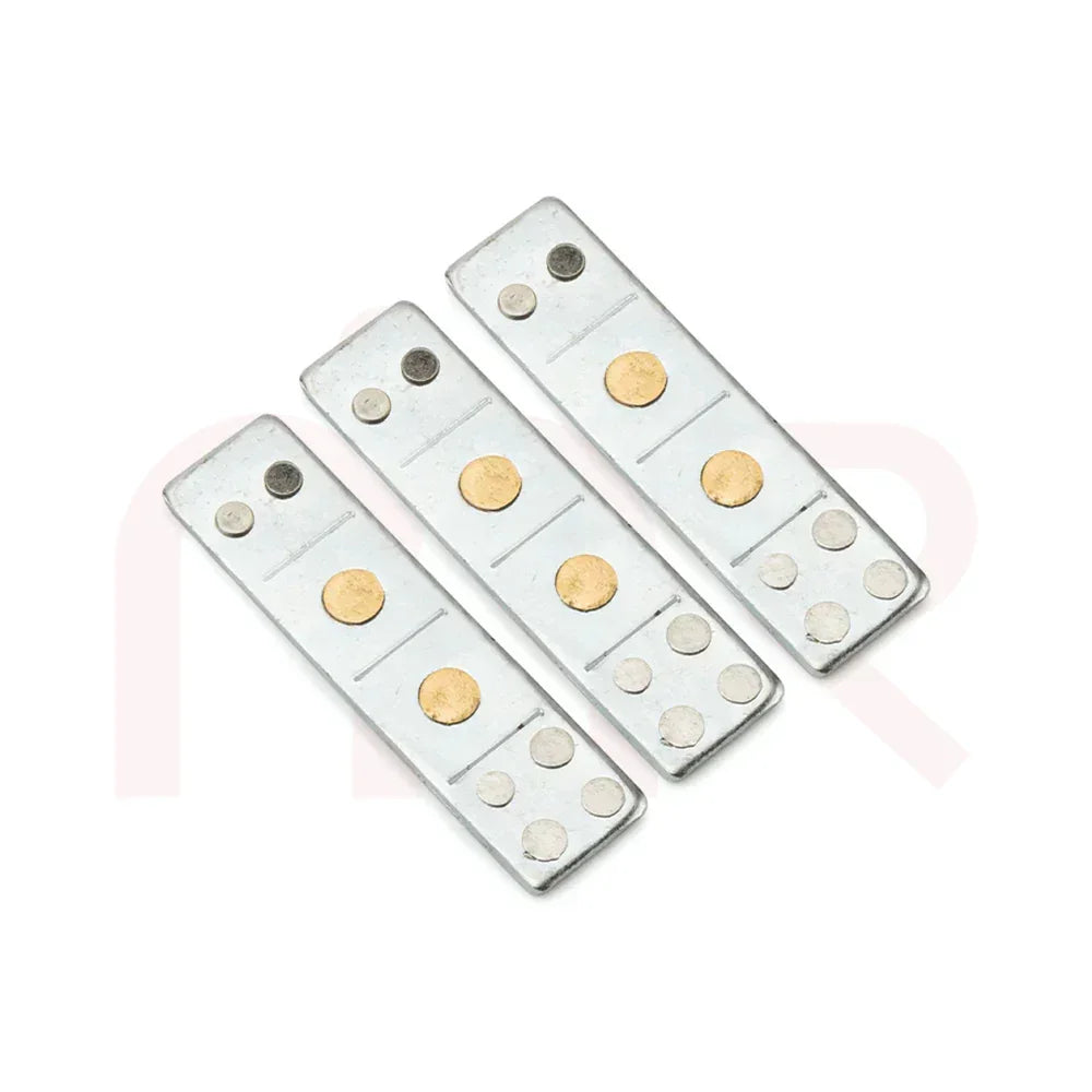 Set of three Maha Vastu metal strips for Vastu remedies, silver with gold dots, on white background