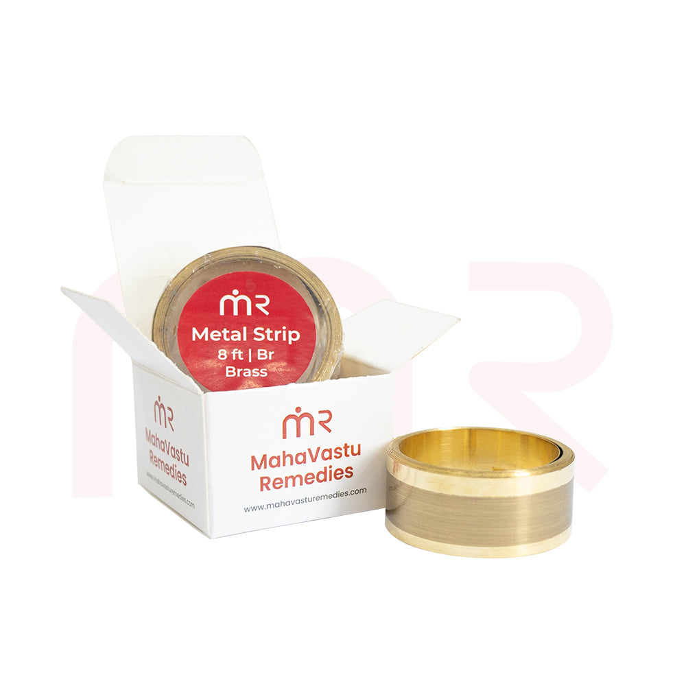 Golden MahaVastu metal strip for Vastu remedies, shown with branded packaging for home energy balance.