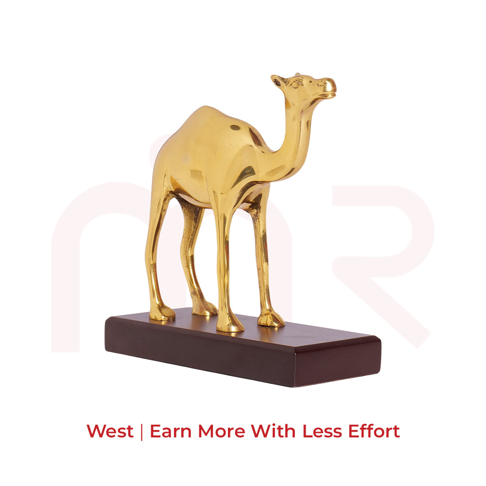 Golden camel figurine on a dark base, used as a Vastu remedy for profit and gains.