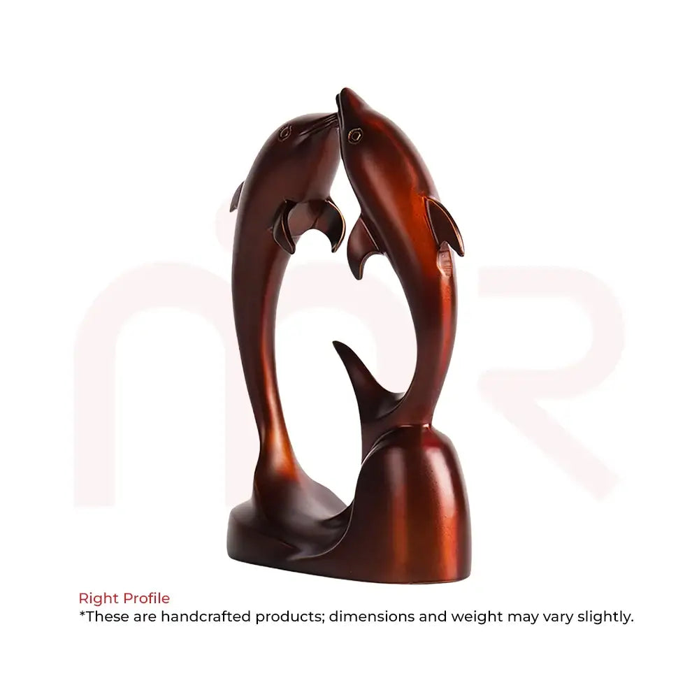 Handcrafted bronze-finish dolphin sculpture for Vastu prosperity and harmony.