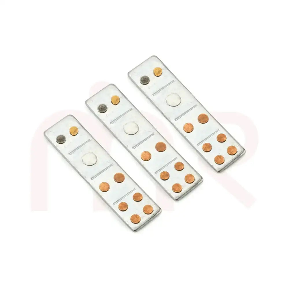 Three silver metal strips with copper dots for Vastu Shastra remedies and space balancing.