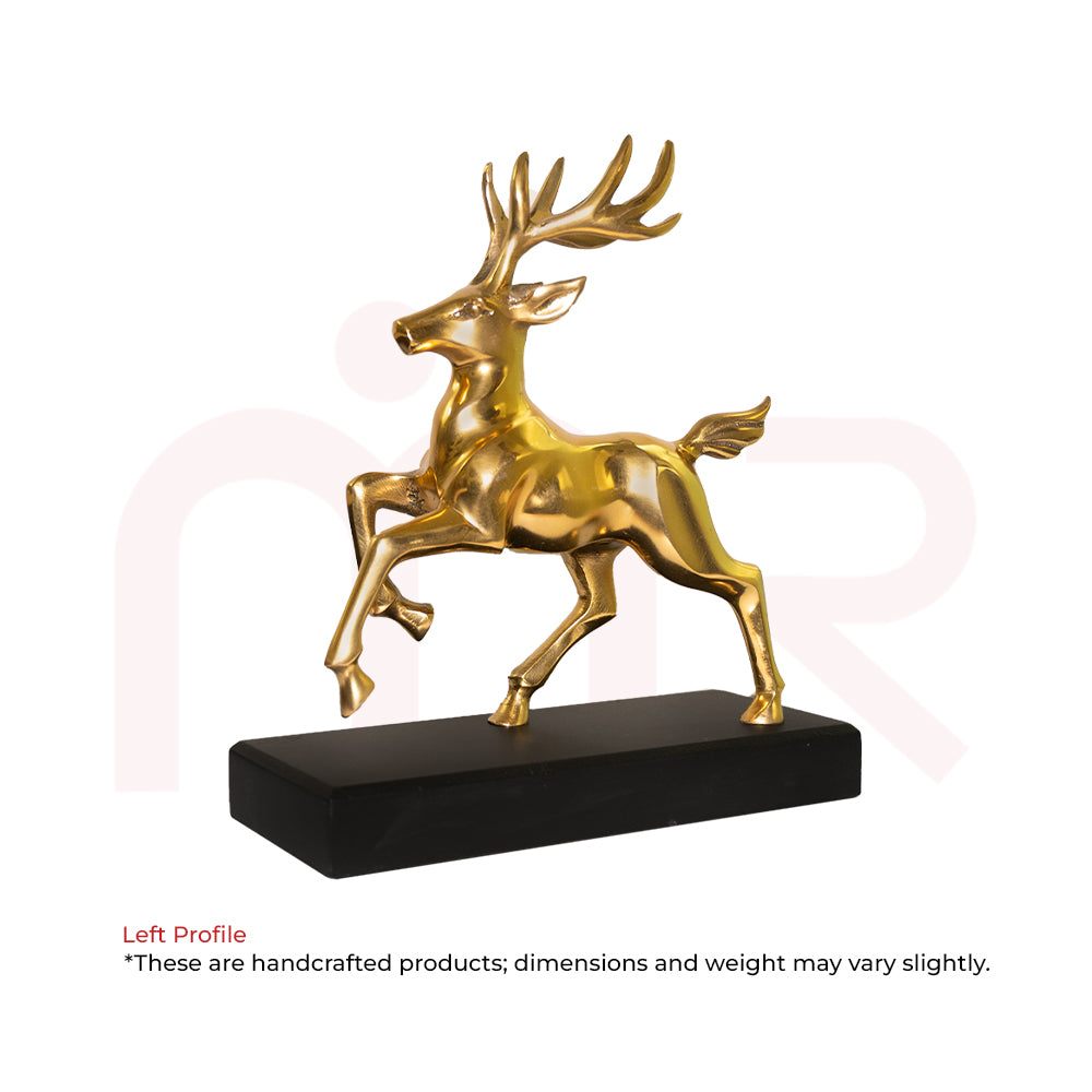 Brass deer figurine in leaping pose on a wooden base, Vastu decor for positivity