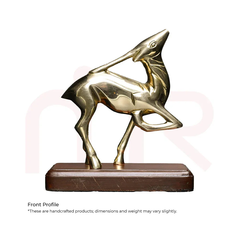 Handcrafted brass deer figurine with leaping pose on a wooden base, Vastu home decor