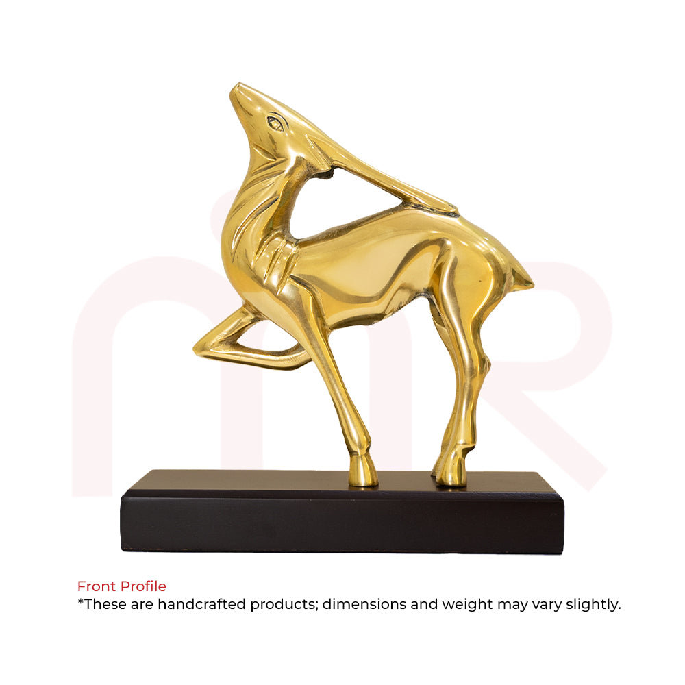 Handcrafted brass deer figurine with leaping pose on a wooden base, Vastu home decor
