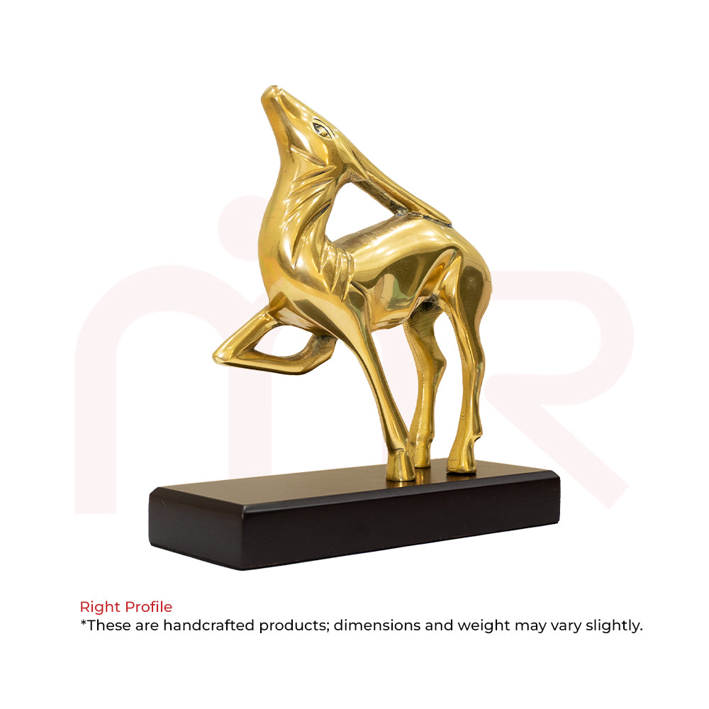 Brass deer statue in leaping pose on a wooden base, Vastu decorative figurine