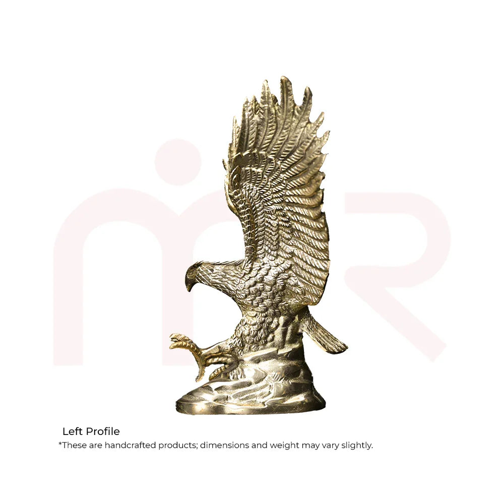 Handcrafted brass eagle statue MahaVastu remedy, detailed wings, left profile on white