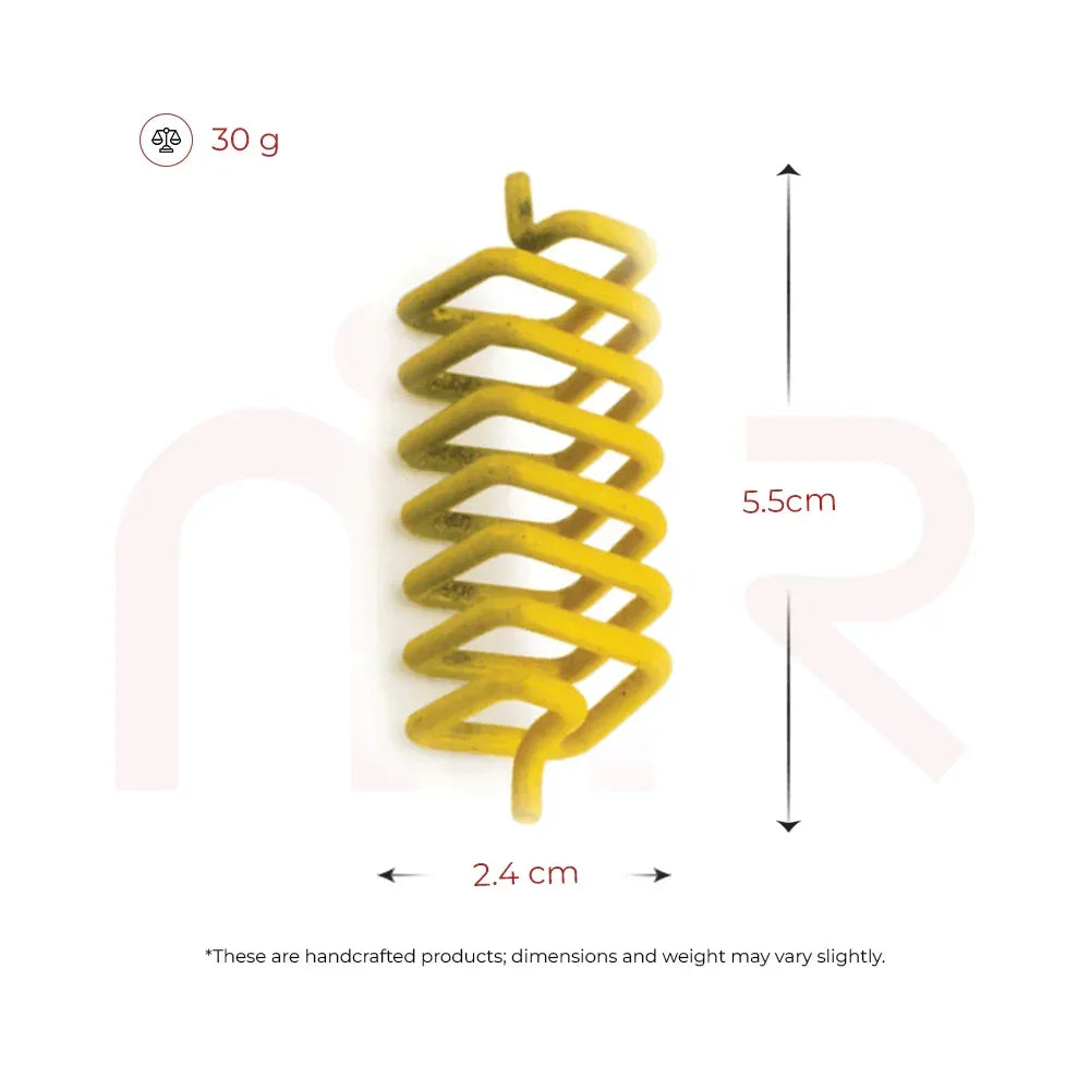 Yellow handcrafted MahaVastu remedy coil, 5.5 cm tall, 2.4 cm wide, 30g weight