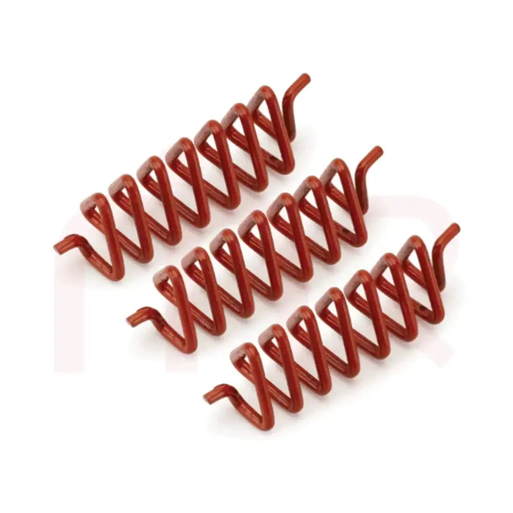 Three red Vastu metal strips for energy balancing and space remedies