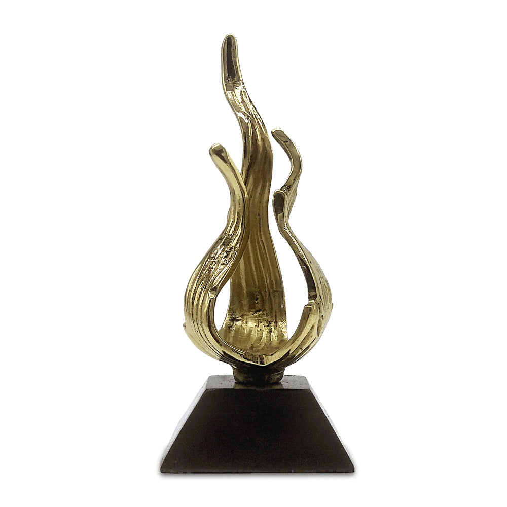 An abstract golden color brass maha vastu sculpture of flame with fluid, intertwining wavy lines on a black square base, showcasing dynamic elegance and grace to bring positive energy to south east direction.