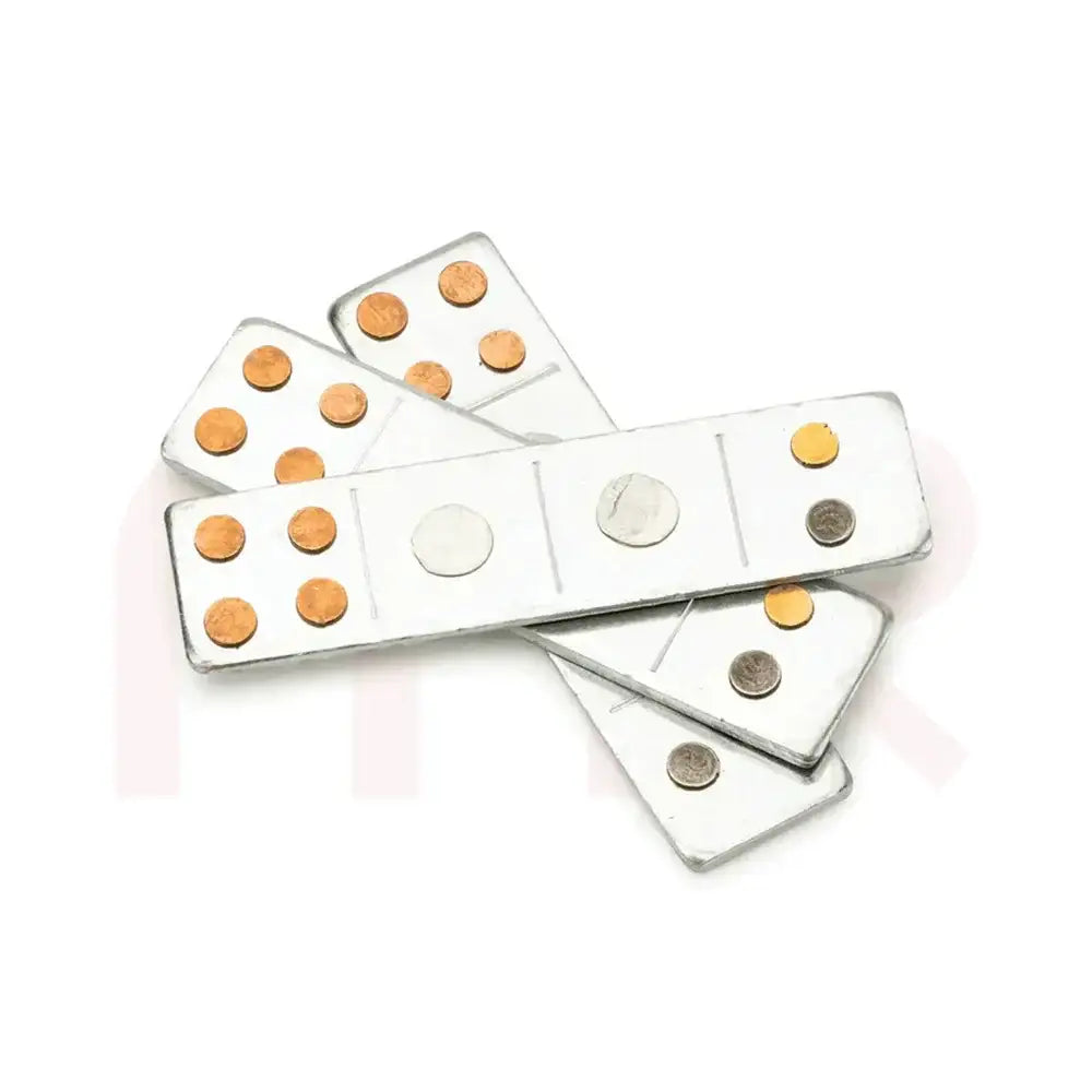 Set of silver metal strips with copper and silver studs for Vastu remedy applications.
