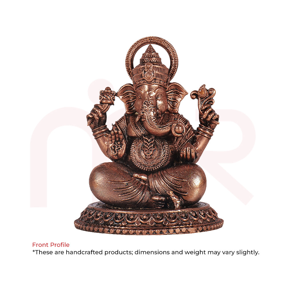 Handcrafted brass Ganesh idol for Vastu, detailed seated deity sculpture, home decor remedy