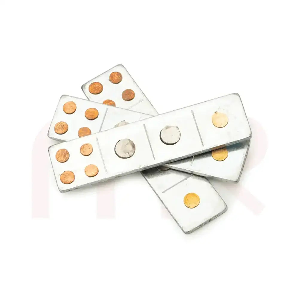 Silver metal strips with copper coins for Vastu Shastra remedies and energy balancing.