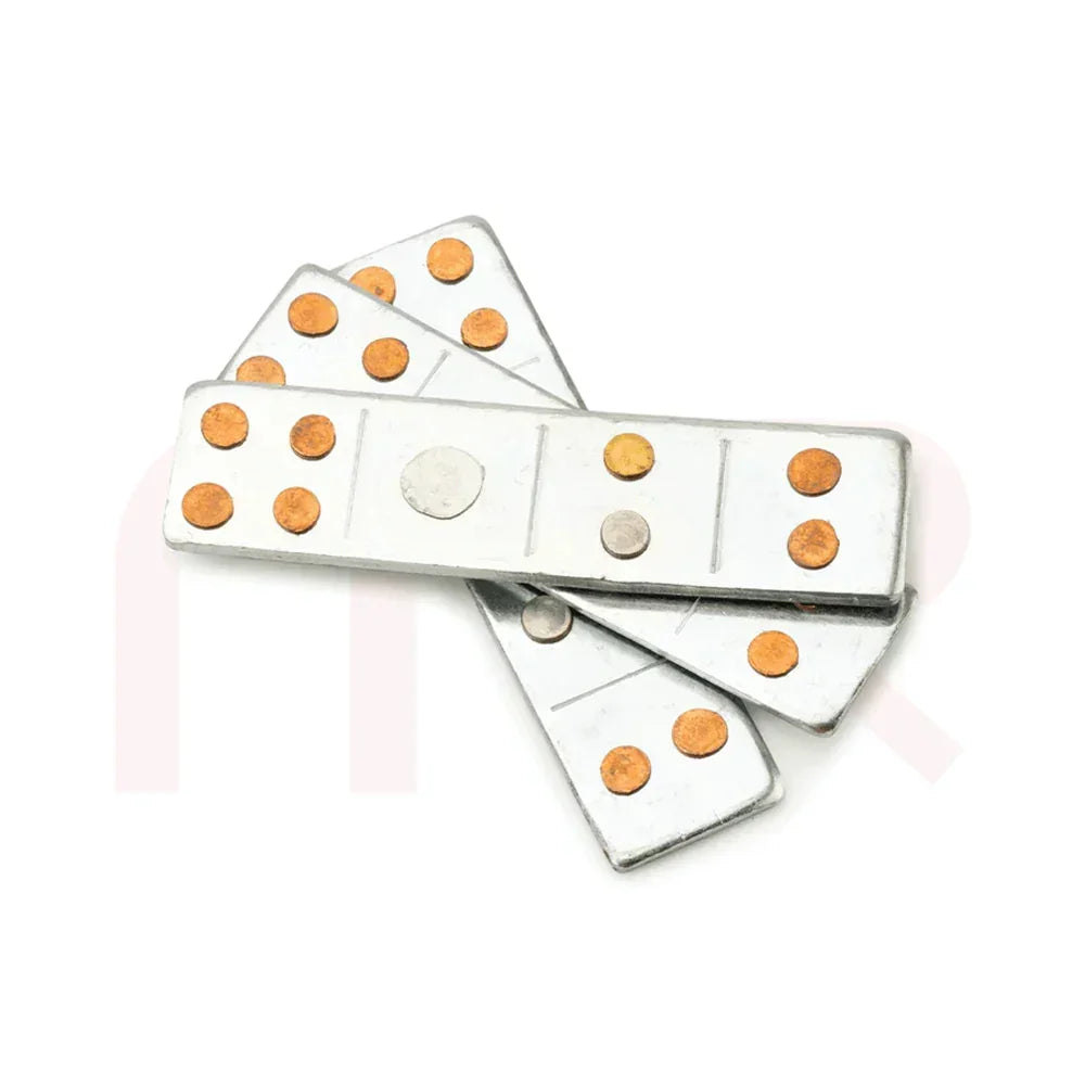 Set of metal MahaVastu remedy strips with copper dots on white background