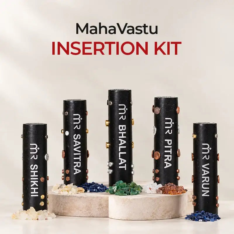 MahaVastu Insertion Kit featuring five black cylinders with crystals for Vastu remedies.