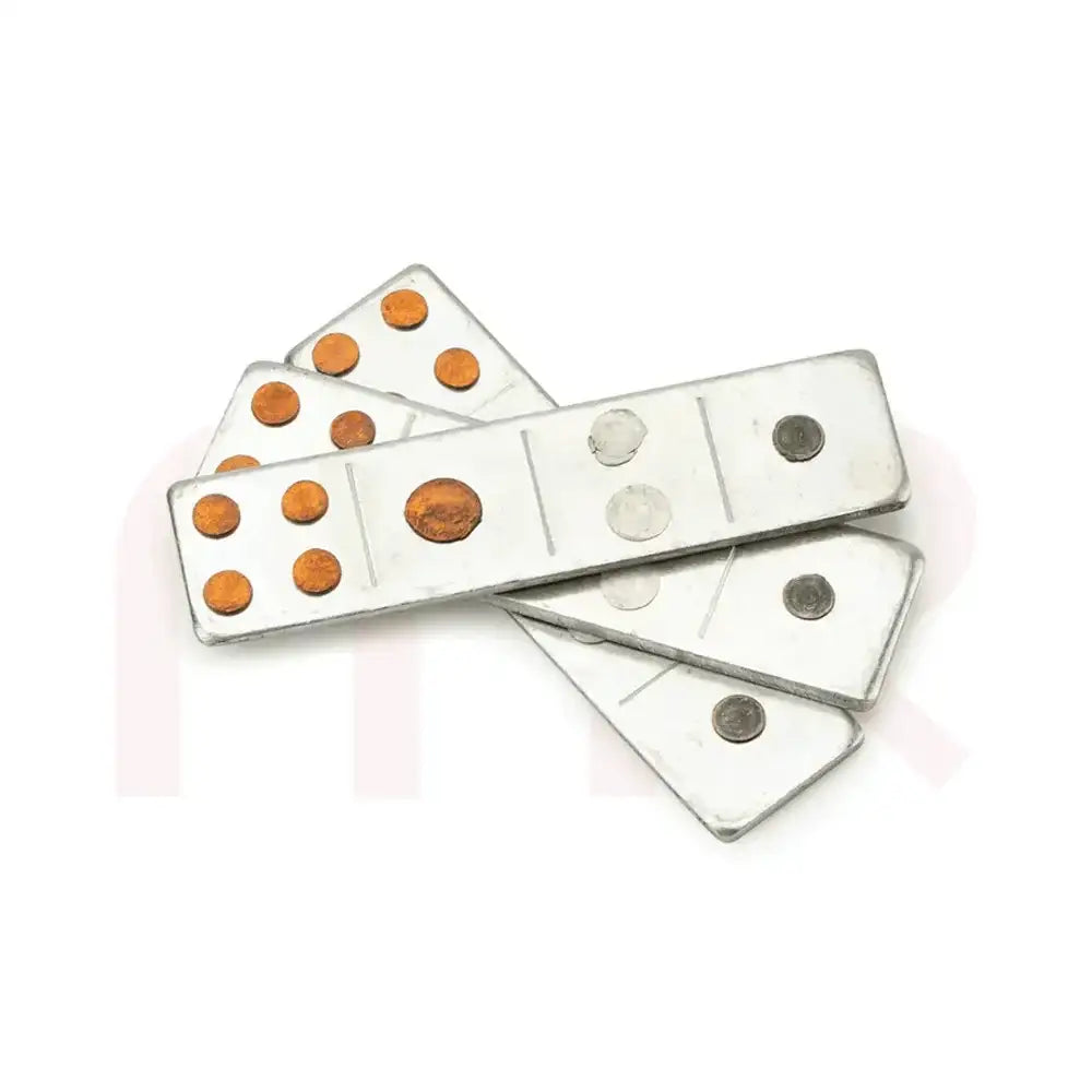 Metal strips with copper and silver dots for Maha Vastu remedies and energy balancing.