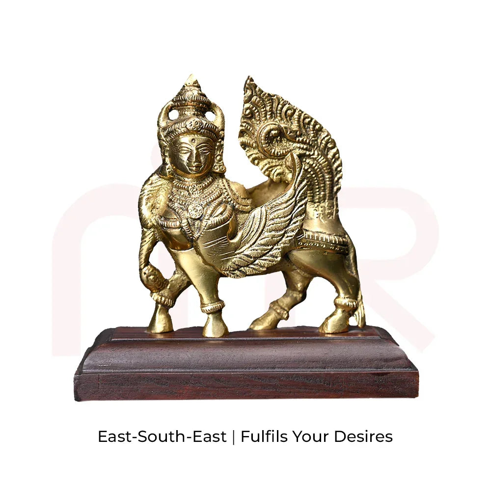 Brass Kamdhenu cow idol on wooden base for Vastu remedies and positive energy