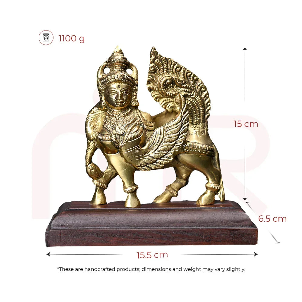 Brass Kamdhenu cow idol for Vastu, ornate design on wooden base, 15.5 cm wide, 15 cm tall
