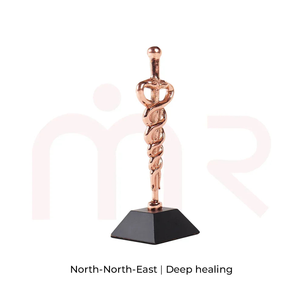 Copper Kundalini serpent Vastu remedy on black base for North-North-East deep healing