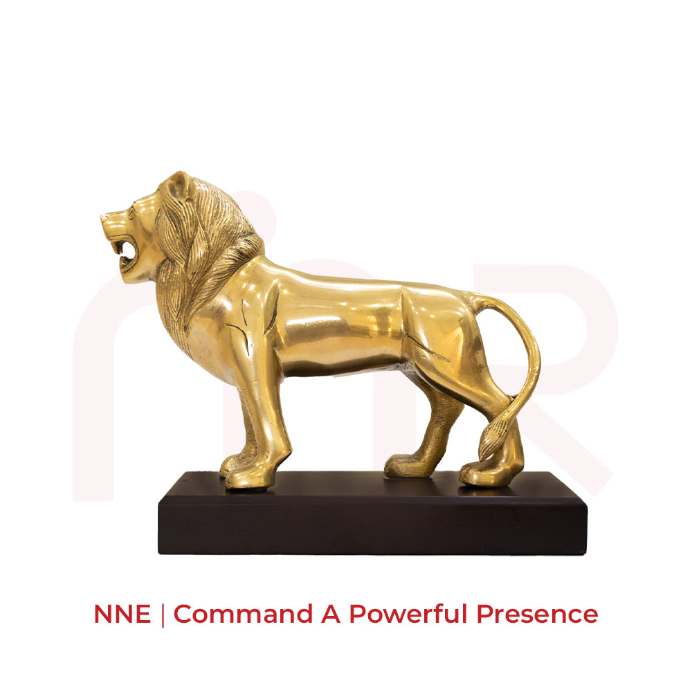 Vastu lion brass idol on wooden base for North-North-East, symbolizing power and majesty