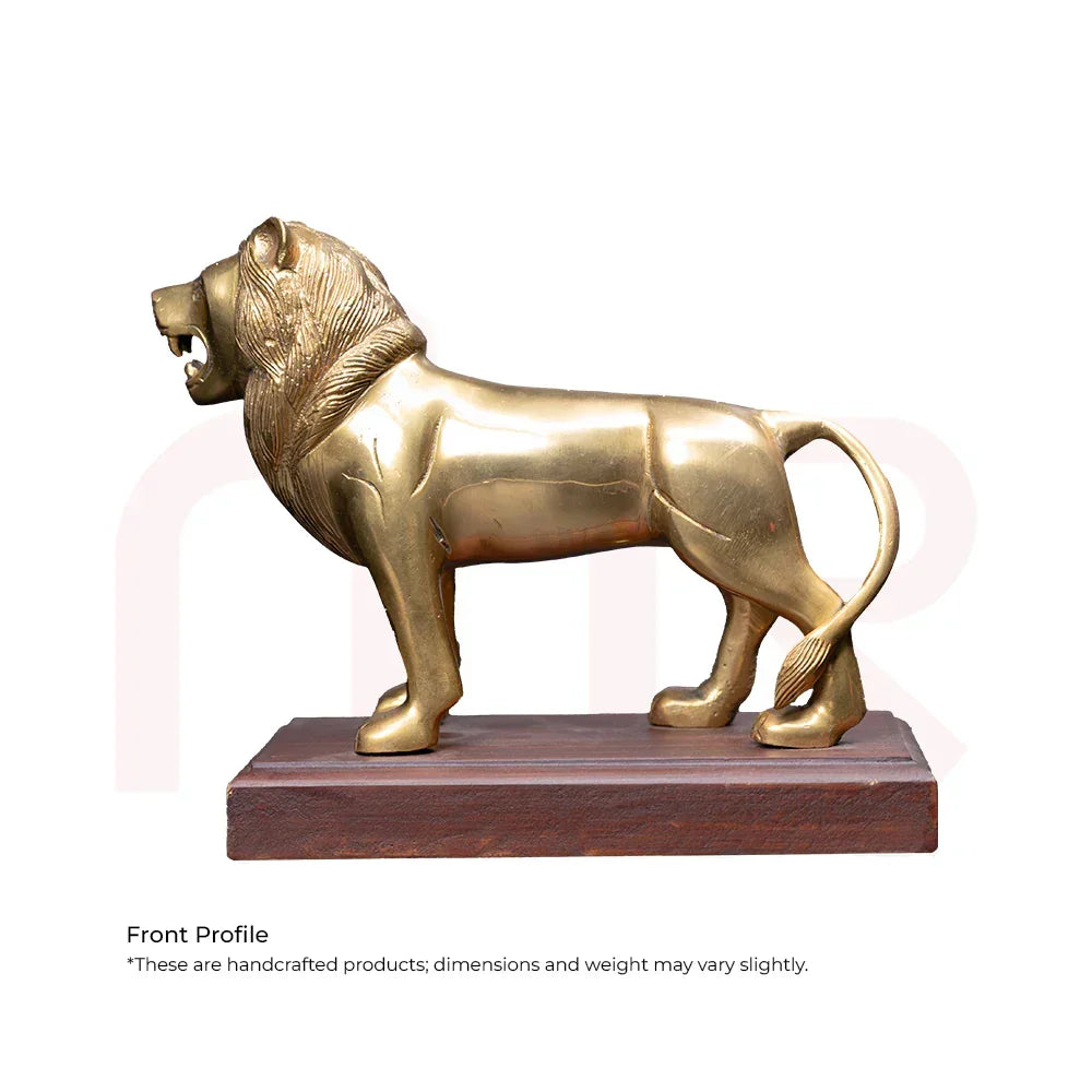 Handcrafted brass lion statue for Vastu, displayed on wooden base