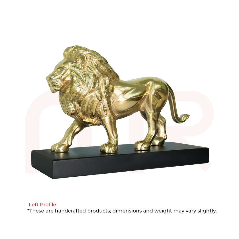Golden lion statue on a black base for Vastu prosperity and positive energy.