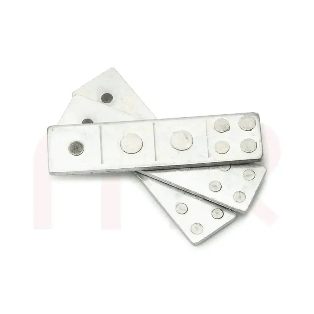 Silver metal strips and pieces for Vastu Shastra remedies and space balancing.