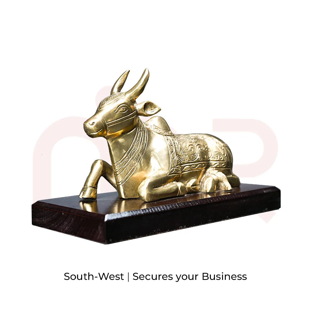 Brass Nandi bull idol for Vastu remedy, displayed on a wooden base, MahaVastu remedies decor