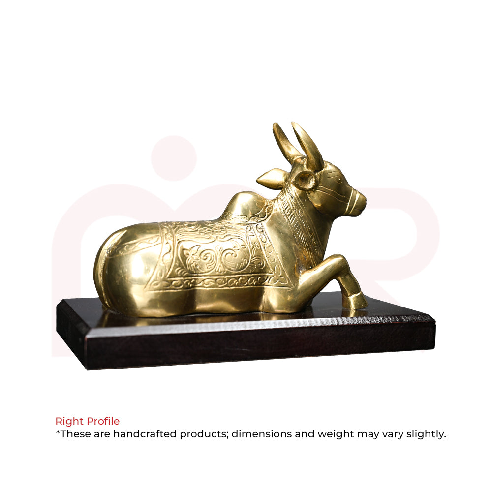 Handcrafted brass Nandi idol for Vastu, decorative home remedy, on wooden base