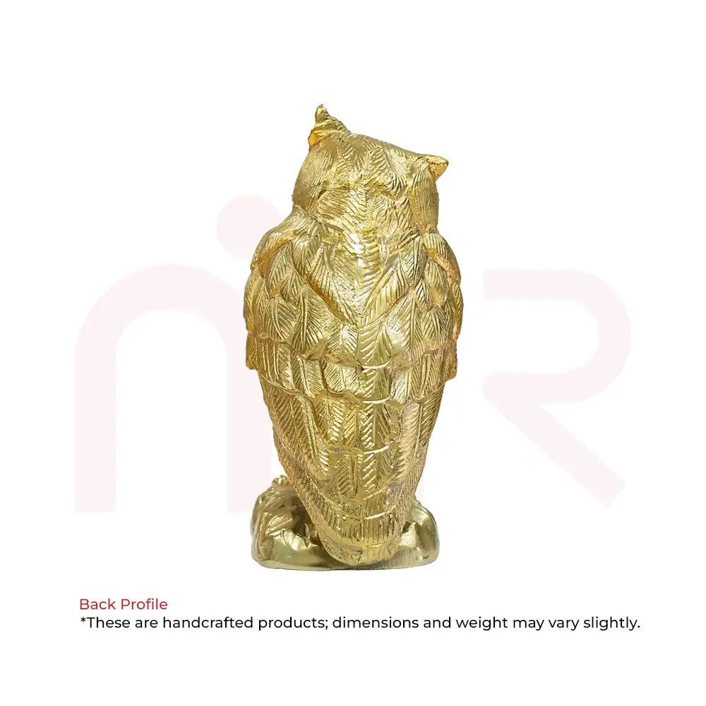 Back profile of a golden owl figurine by MahaVastu Remedies for smart money decisions.