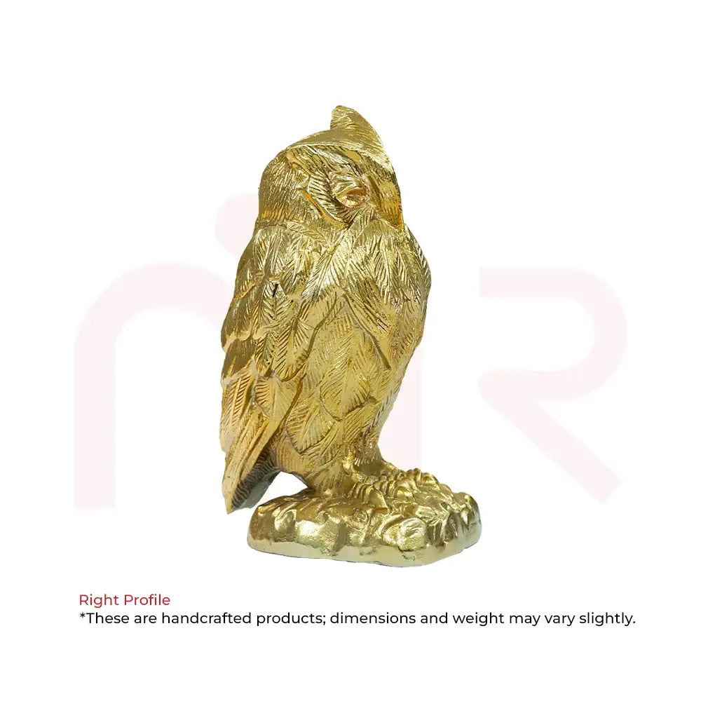Right profile view of a golden owl idol for smart money decisions by MahaVastu Remedies
