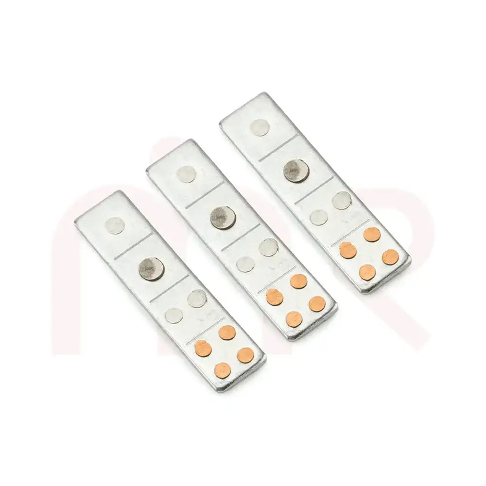 Three silver metal strips with copper dots for Vastu Shastra remedies