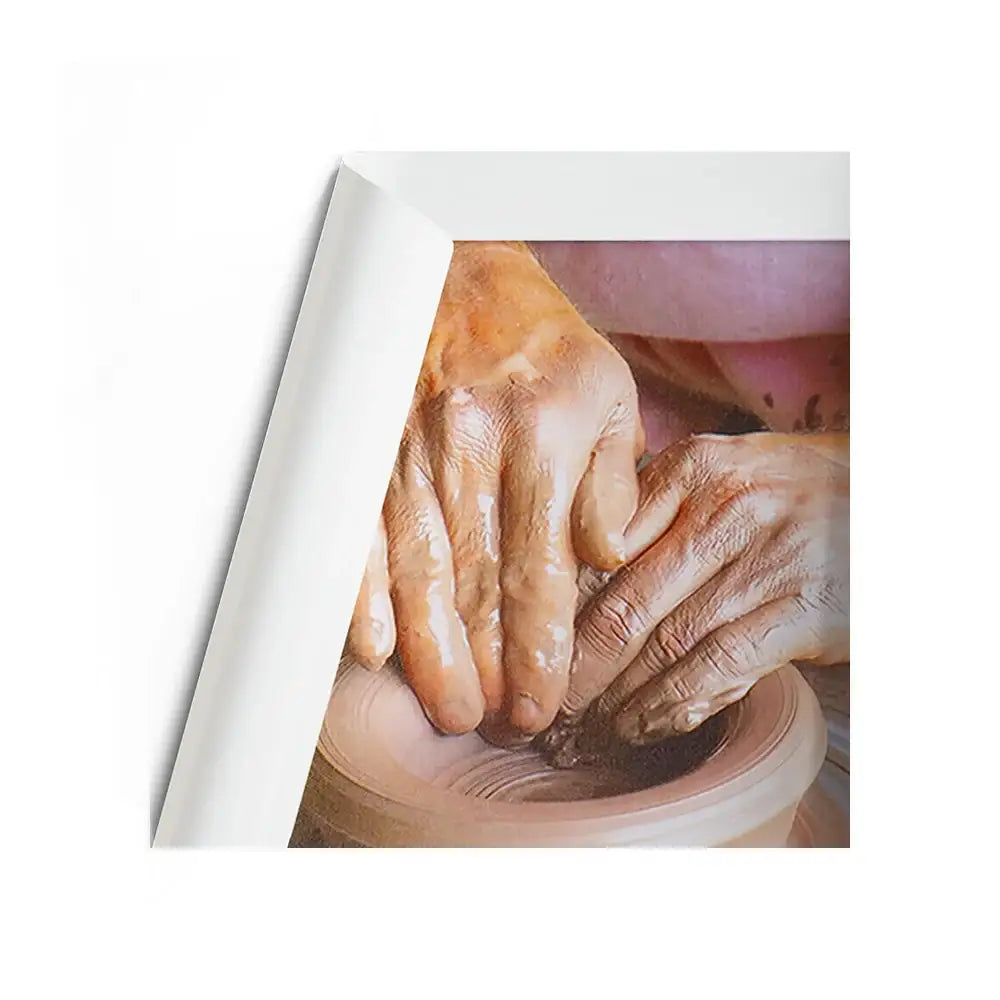 Hands shaping clay on pottery wheel, Vastu-friendly wall art for positive energy and creativity