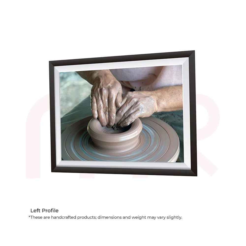 Framed wall art of hands shaping clay on potter's wheel, Maha Vastu Shastra remedy decor