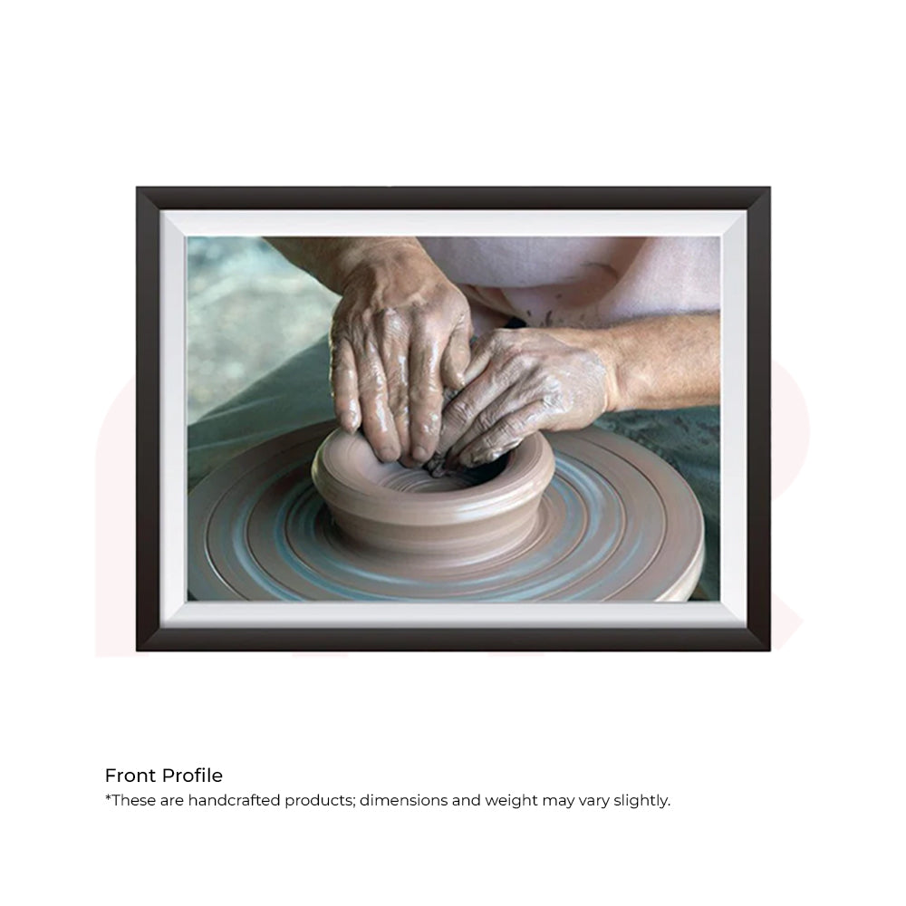 Framed photo of hands shaping clay on a pottery wheel, MahaVastu handcrafted decor art