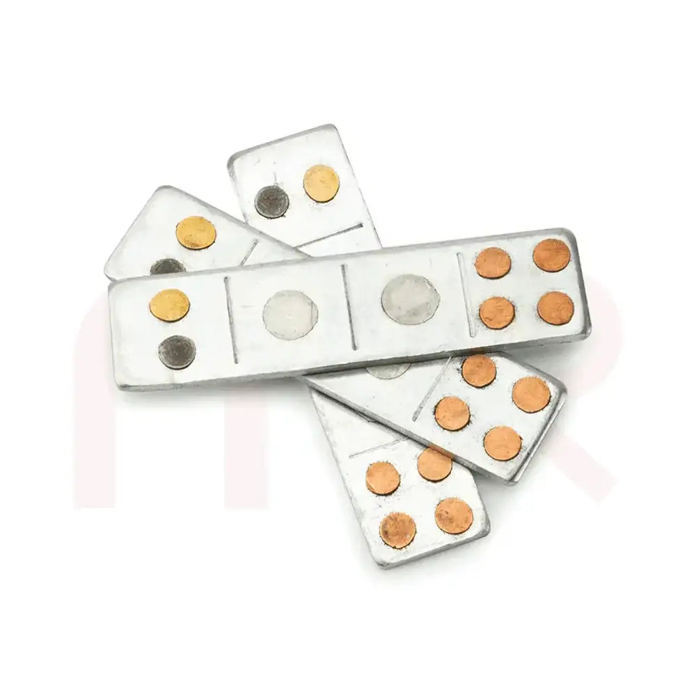 Metal strips with copper and silver dots for Vastu Shastra remedies