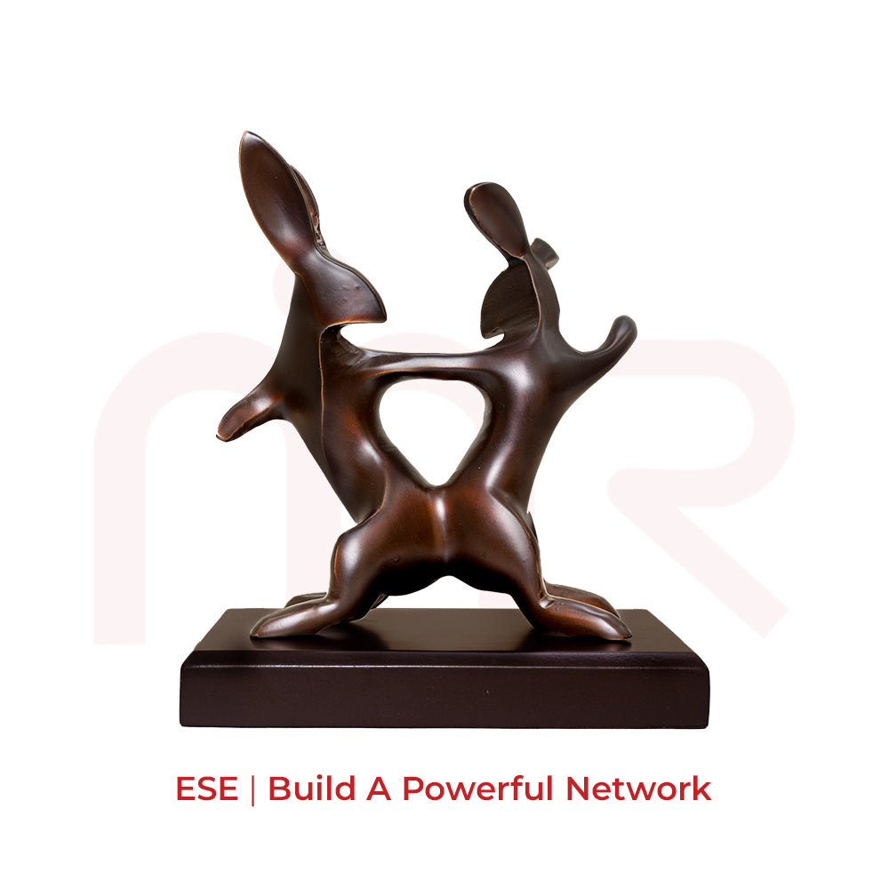 Bronze rabbit pair statue on wooden base, Vastu remedy for business connections.