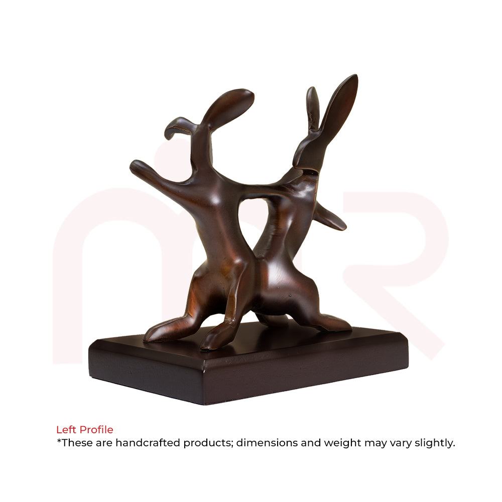 Handcrafted bronze rabbit couple figurine on wooden base, ideal for Vastu decor and positivity