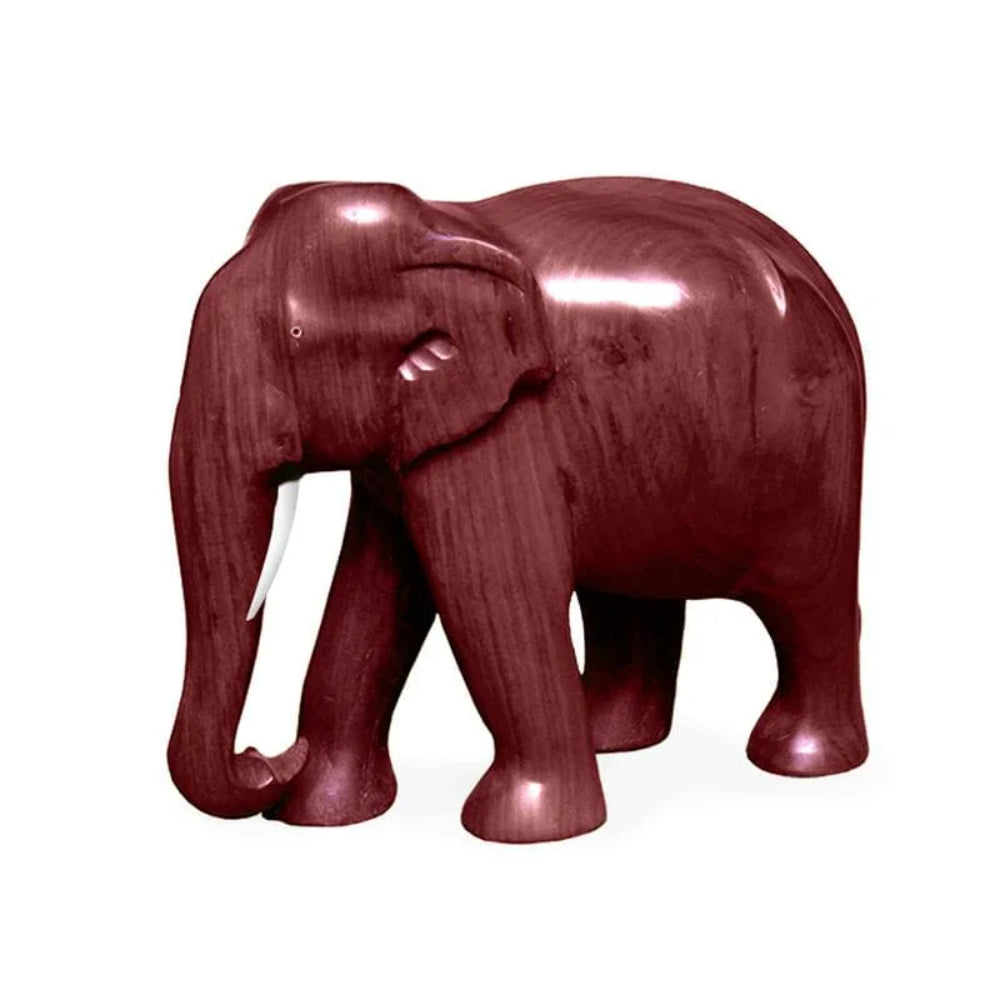 A finely crafted wooden elephant showpiece with a rich, dark stain, showcasing intricate details and a smooth finish, with its trunk down and tusks visible, giving it a majestic appearance.