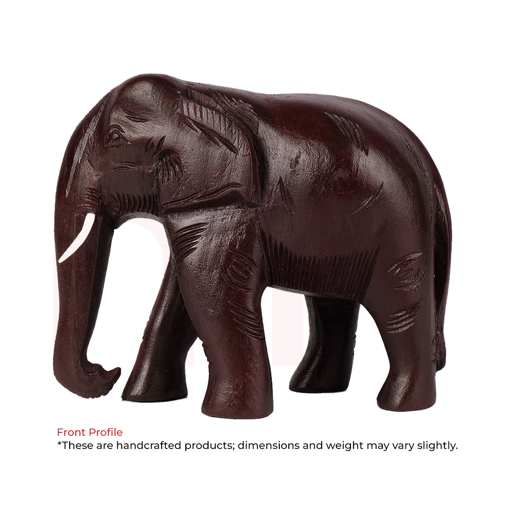 Handcrafted red elephant figurine for Vastu, wood texture, symbol of prosperity decor