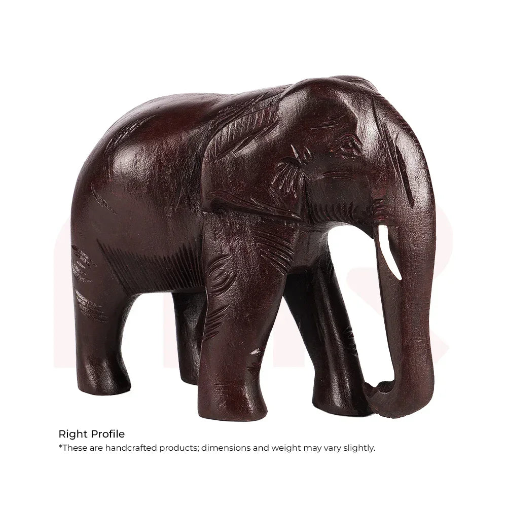 Handcrafted red wooden elephant statue with carved details for Vastu decor