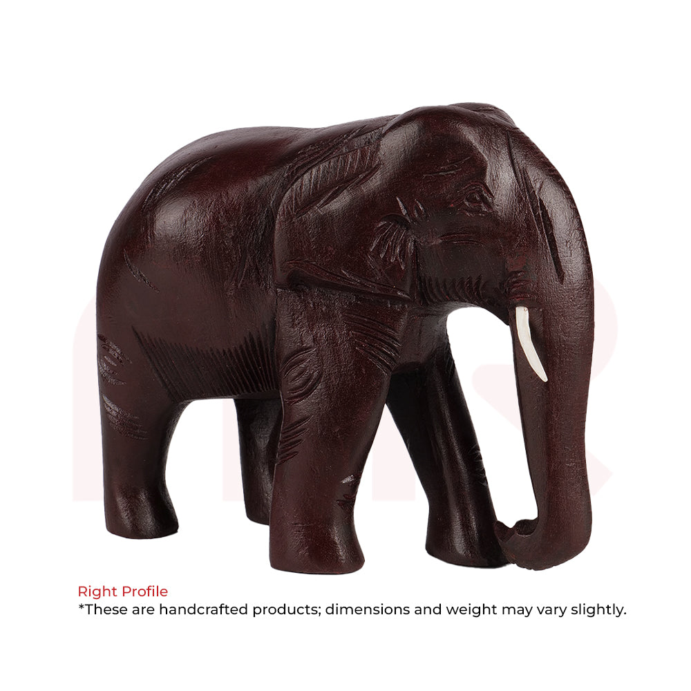 Handcrafted red wooden elephant statue with carved details for Vastu decor