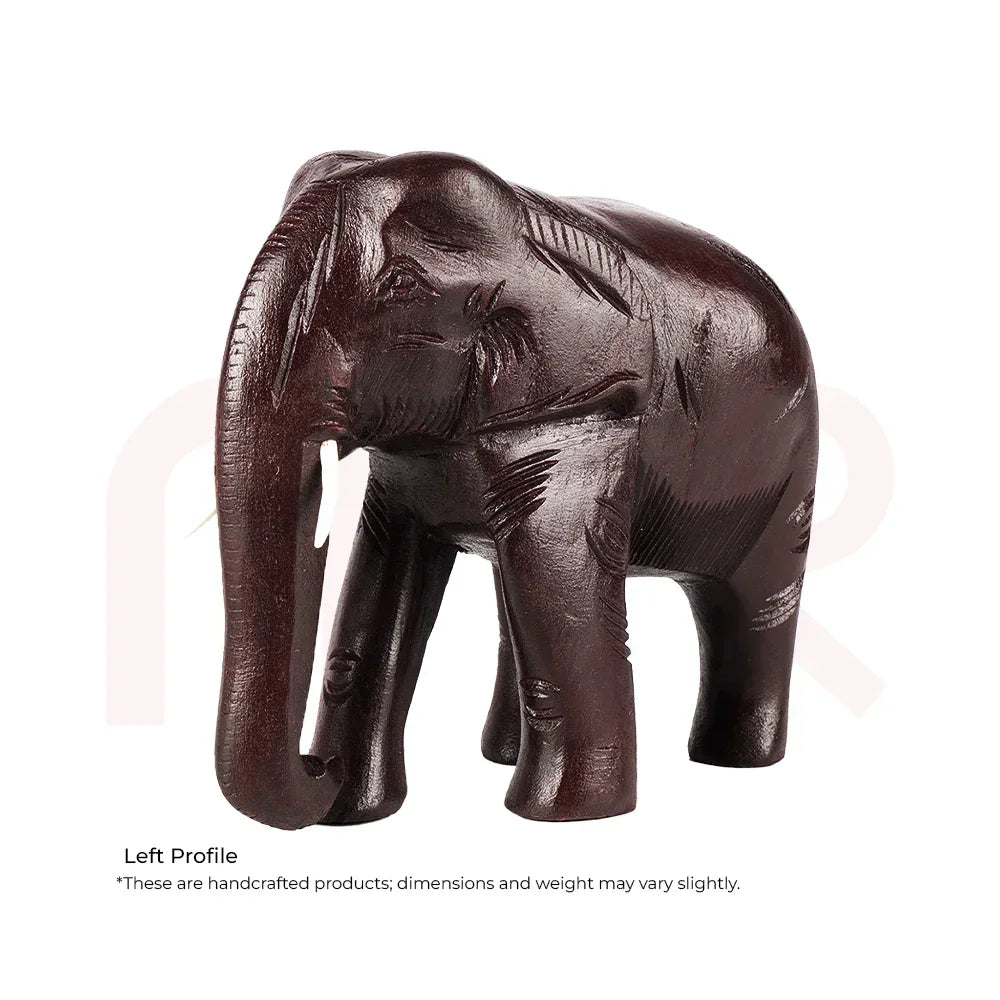 Handcrafted red elephant figurine for Vastu decor, carved wooden ornament.