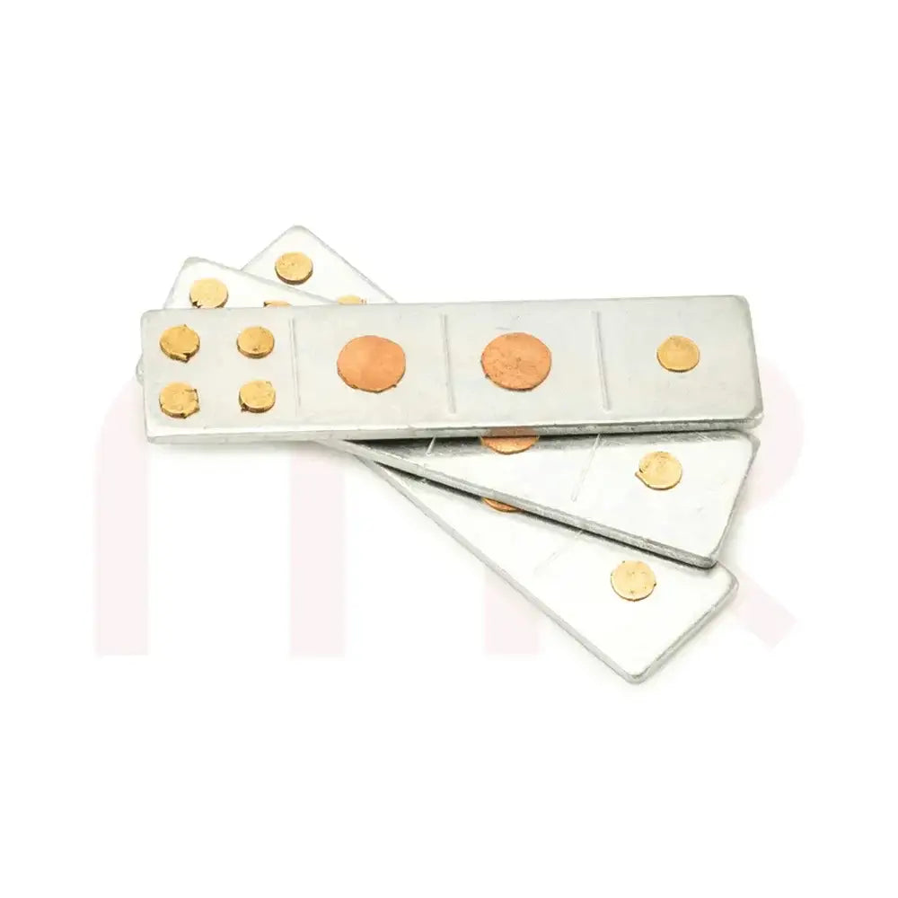 Silver metal strips with copper discs for Vastu Shastra remedies and space balancing.